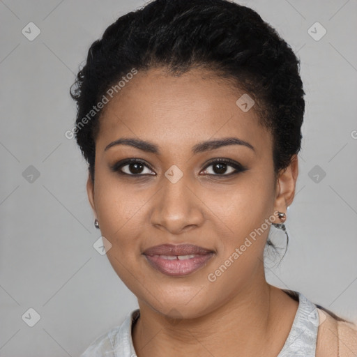 Joyful black young-adult female with short  black hair and brown eyes