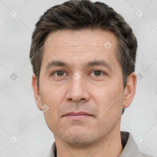 Neutral white adult male with short  brown hair and brown eyes