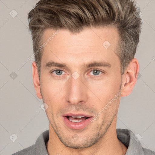 Joyful white adult male with short  brown hair and brown eyes