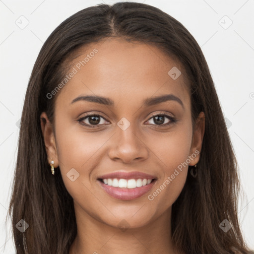 Joyful white young-adult female with long  brown hair and brown eyes