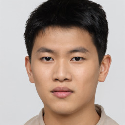 Neutral asian young-adult male with short  brown hair and brown eyes