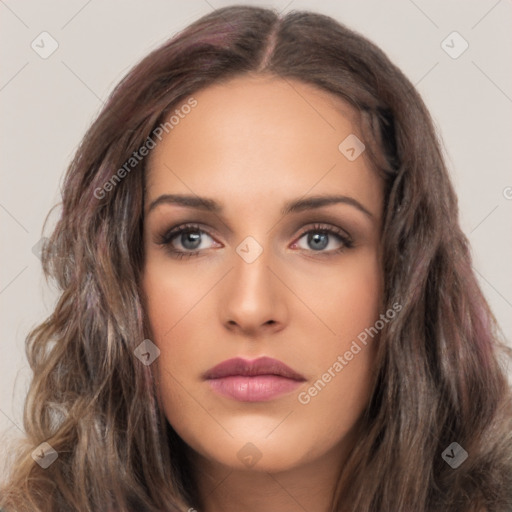 Neutral white young-adult female with long  brown hair and brown eyes