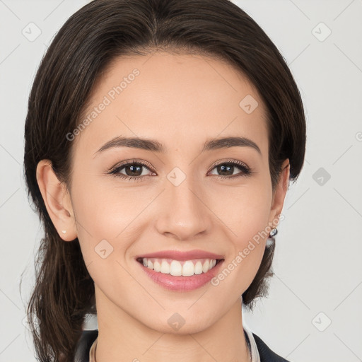 Joyful white young-adult female with medium  brown hair and brown eyes