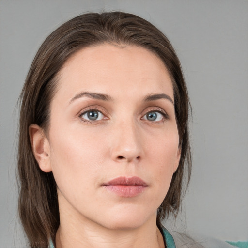 Neutral white young-adult female with medium  brown hair and grey eyes