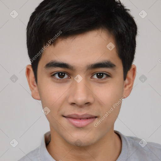 Joyful asian young-adult male with short  brown hair and brown eyes