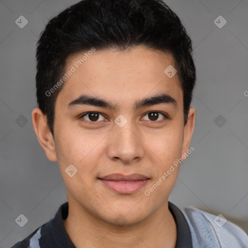 Joyful latino young-adult male with short  brown hair and brown eyes