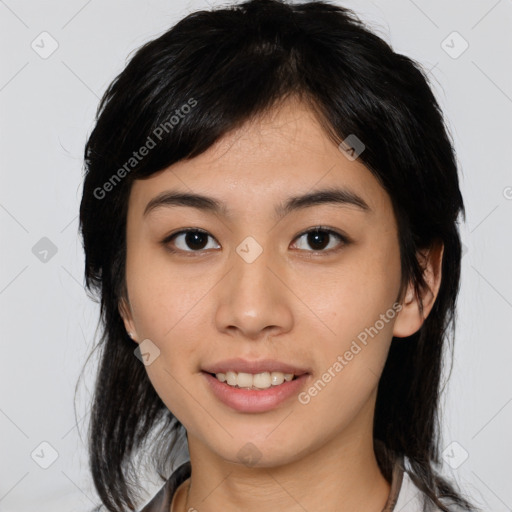 Joyful asian young-adult female with medium  black hair and brown eyes