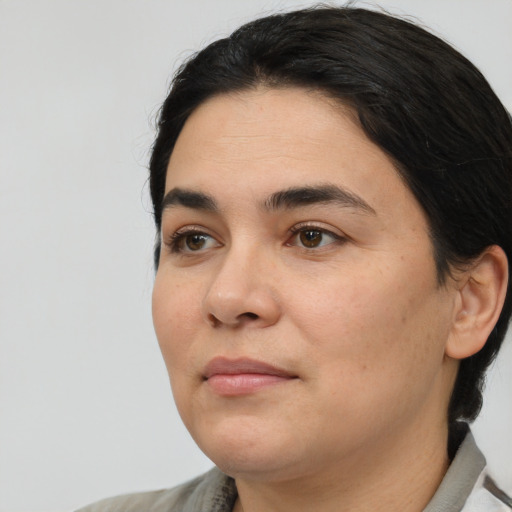 Neutral white young-adult female with medium  black hair and brown eyes