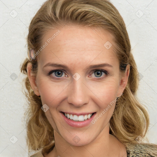 Joyful white young-adult female with medium  brown hair and blue eyes