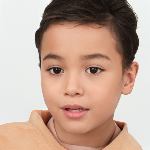 Joyful white child female with short  brown hair and brown eyes