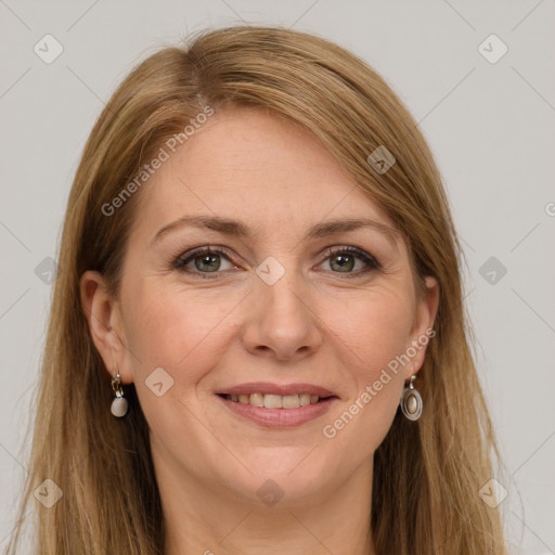 Joyful white adult female with long  brown hair and grey eyes