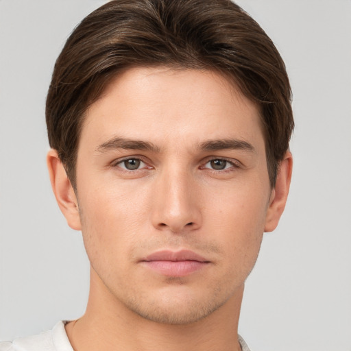 Neutral white young-adult male with short  brown hair and brown eyes