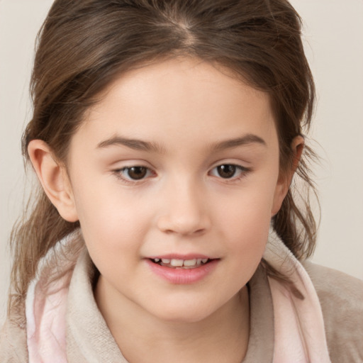 Joyful white child female with medium  brown hair and brown eyes