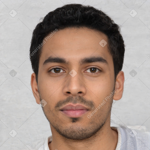 Neutral latino young-adult male with short  black hair and brown eyes