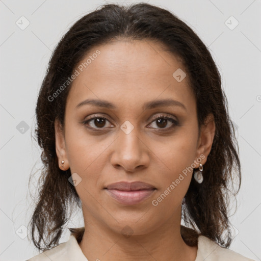 Joyful black young-adult female with medium  brown hair and brown eyes