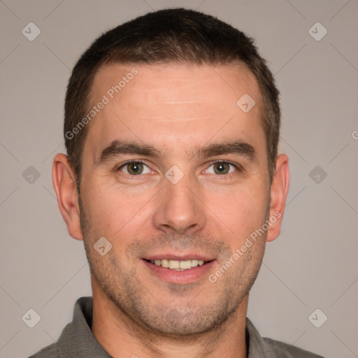 Joyful white adult male with short  brown hair and brown eyes