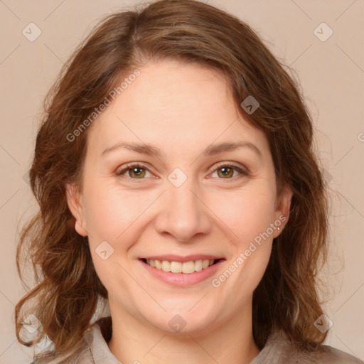 Joyful white young-adult female with medium  brown hair and green eyes