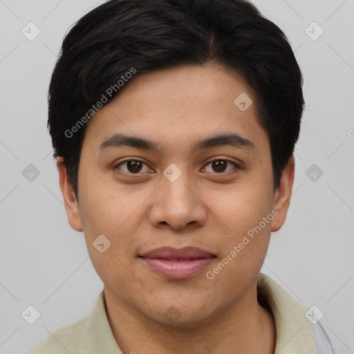 Joyful asian young-adult male with short  brown hair and brown eyes