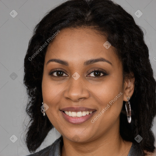 Joyful latino young-adult female with long  brown hair and brown eyes