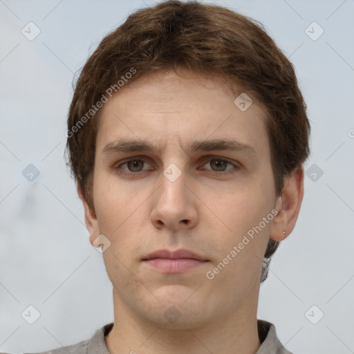 Neutral white young-adult male with short  brown hair and grey eyes