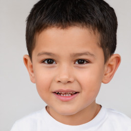 Joyful white child male with short  brown hair and brown eyes