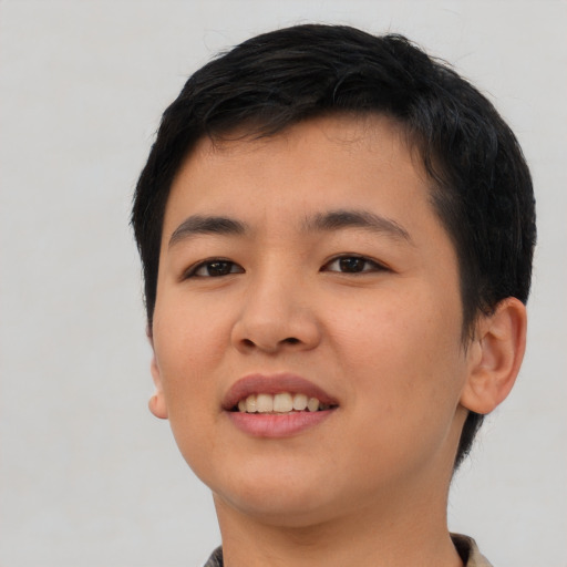 Joyful asian young-adult female with short  black hair and brown eyes