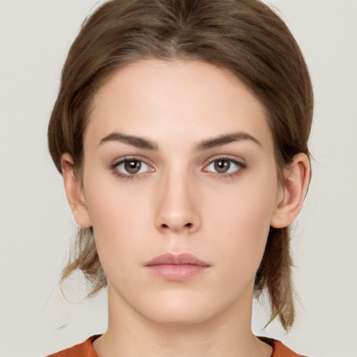 Neutral white young-adult female with medium  brown hair and brown eyes