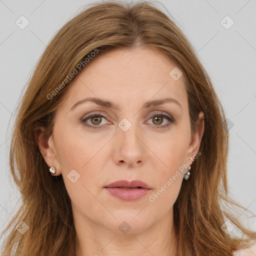 Joyful white adult female with long  brown hair and brown eyes