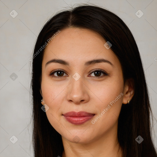 Joyful latino young-adult female with long  brown hair and brown eyes