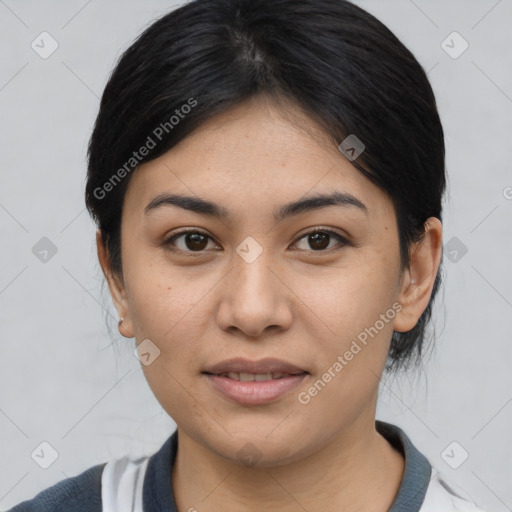 Joyful asian young-adult female with medium  black hair and brown eyes