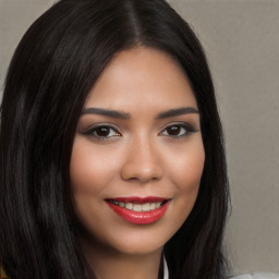 Joyful white young-adult female with long  black hair and brown eyes