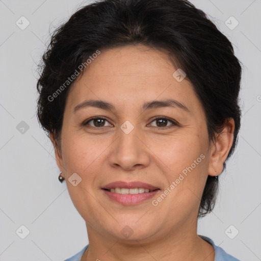 Joyful white adult female with short  brown hair and brown eyes