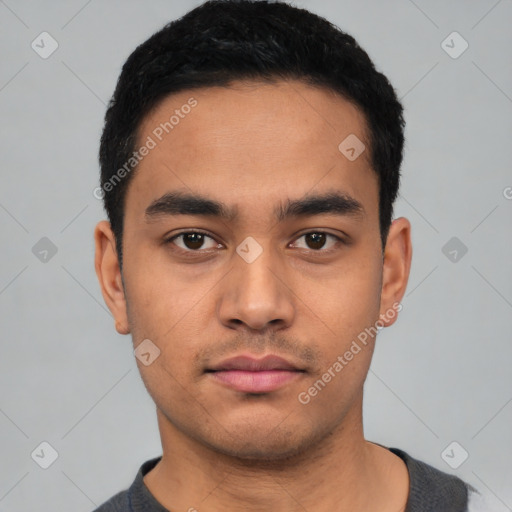 Neutral latino young-adult male with short  black hair and brown eyes