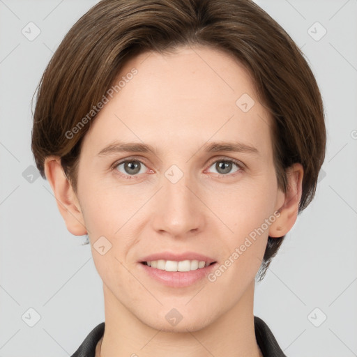 Joyful white young-adult female with short  brown hair and grey eyes