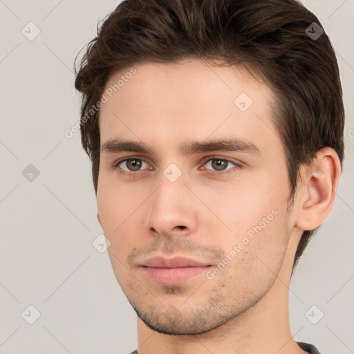 Neutral white young-adult male with short  brown hair and brown eyes