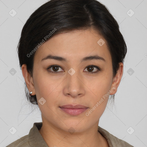 Joyful latino young-adult female with short  brown hair and brown eyes