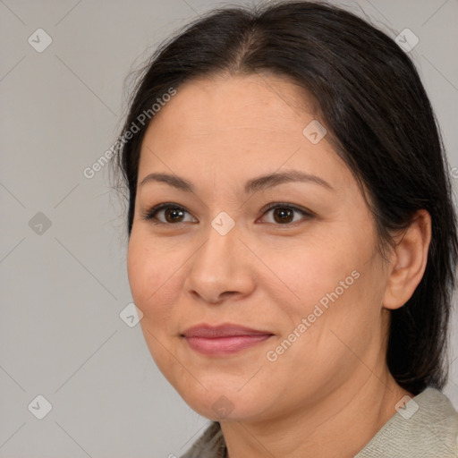 Joyful white adult female with medium  brown hair and brown eyes