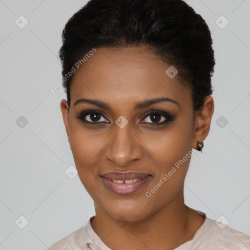 Joyful black young-adult female with short  brown hair and brown eyes