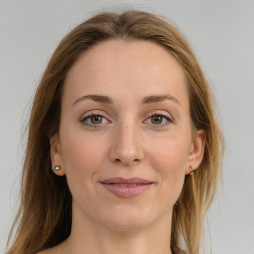 Joyful white young-adult female with long  brown hair and grey eyes