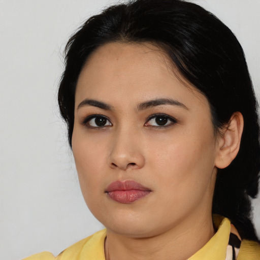 Neutral asian young-adult female with medium  black hair and brown eyes