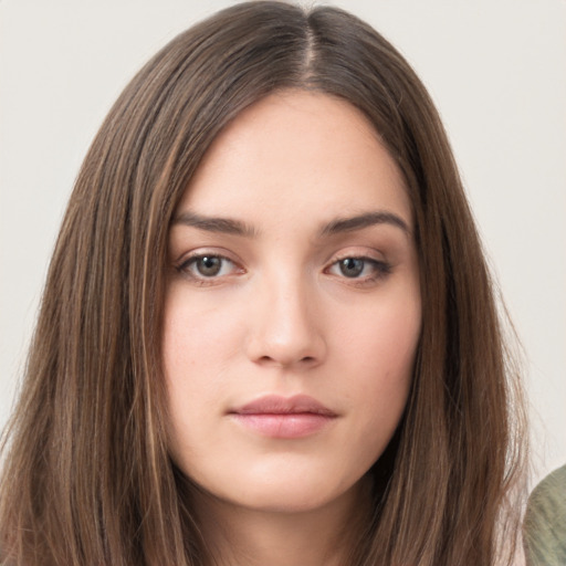 Neutral white young-adult female with long  brown hair and brown eyes