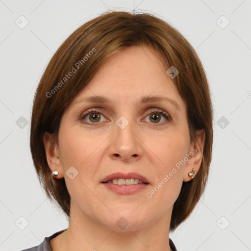 Joyful white adult female with medium  brown hair and grey eyes