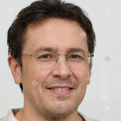 Joyful white adult male with short  brown hair and brown eyes