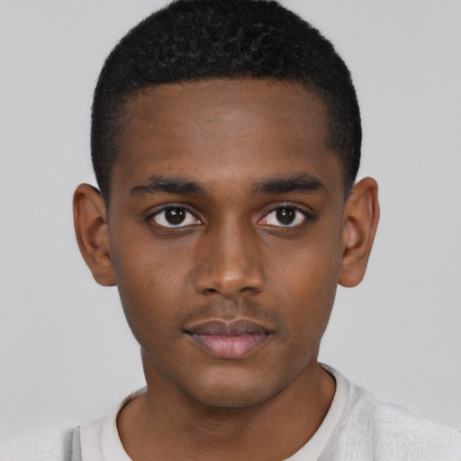 Neutral black child male with short  black hair and brown eyes