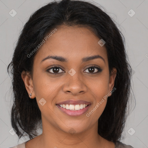 Joyful black young-adult female with medium  brown hair and brown eyes