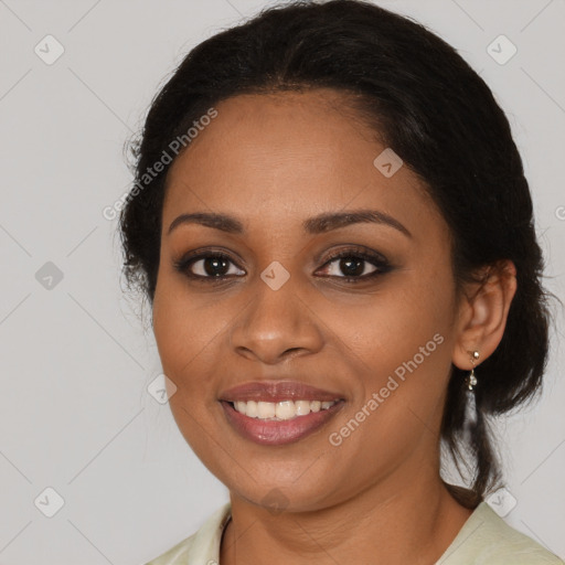 Joyful black young-adult female with medium  brown hair and brown eyes