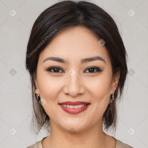 Joyful latino young-adult female with medium  brown hair and brown eyes