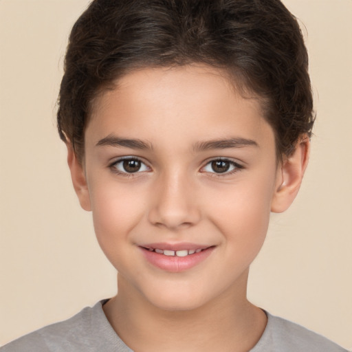 Joyful white child female with short  brown hair and brown eyes