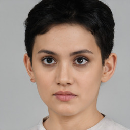 Neutral white young-adult female with short  brown hair and brown eyes