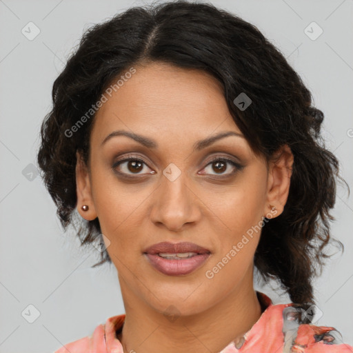 Joyful black adult female with medium  brown hair and brown eyes